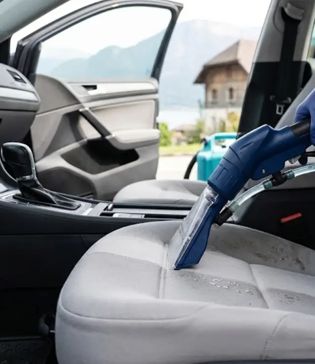 Nettoyage de sièges de voiture par injection-extraction, tissu ravivé